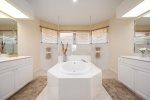Main Bathroom with Wrap Around Shower and Garden Tub as well as Dual Sinks
